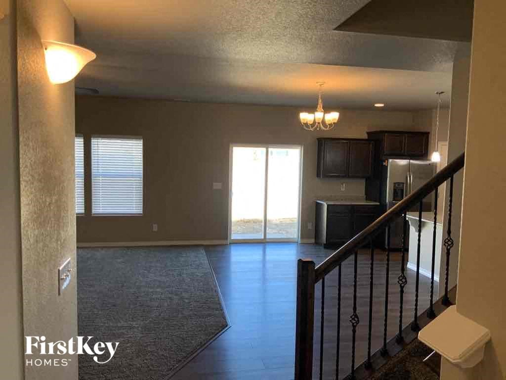 A view of a living room from the hallway.