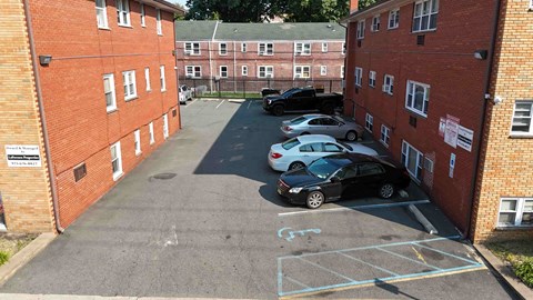 A parking lot with cars parked in it.