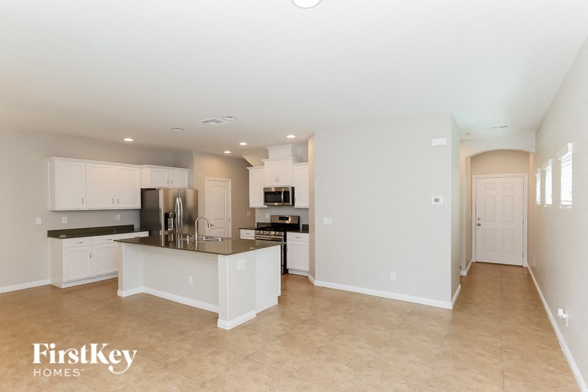 A kitchen with a countertop and a sink.
