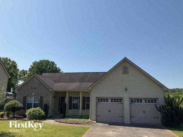 A house with a garage is for sale by FirstKey Homes.
