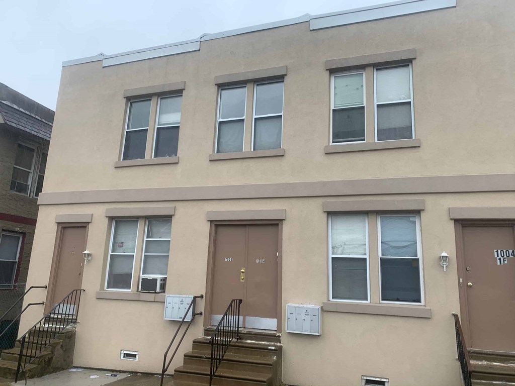 A building with brown doors and windows.