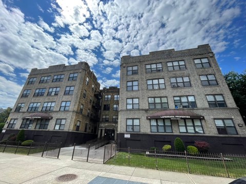 A large building with the words "Lafayette Properties" on the front.