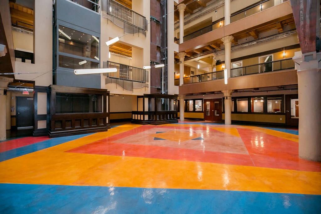 a colorful floor in the middle of a building