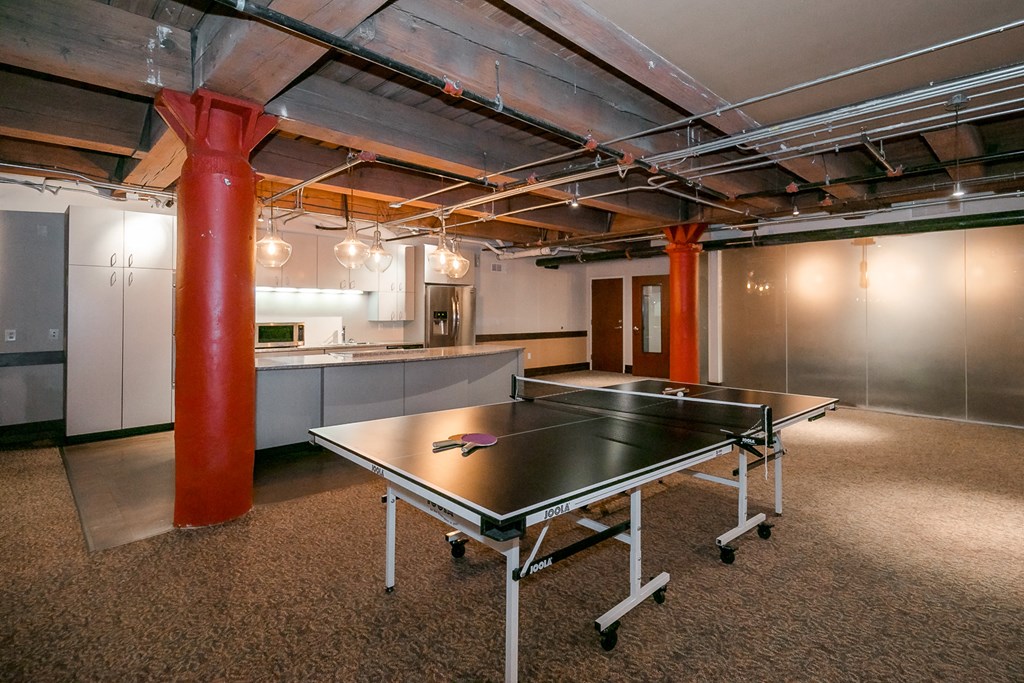 ?? gym and ping pong table in an underground garage
