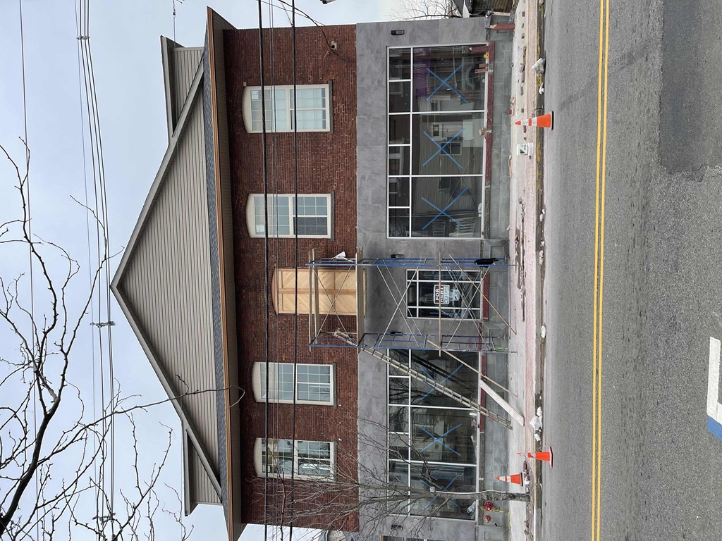 the side of a building with scaffolding on it