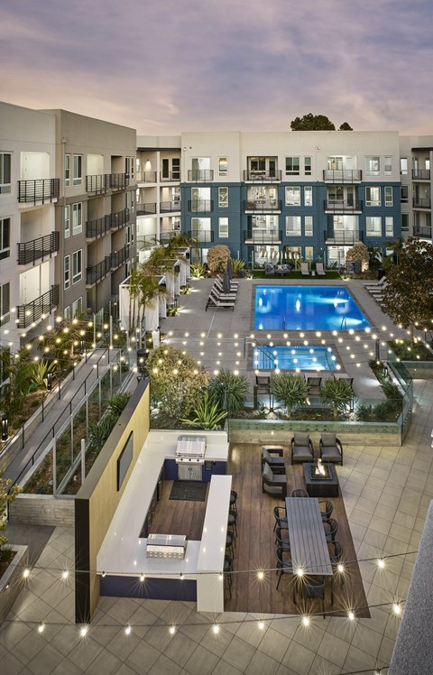 Sky Lounge View Overlooking Kaia South Bay Aerial view of Kaia South Bay featuring apartment buildings and resort-style pool