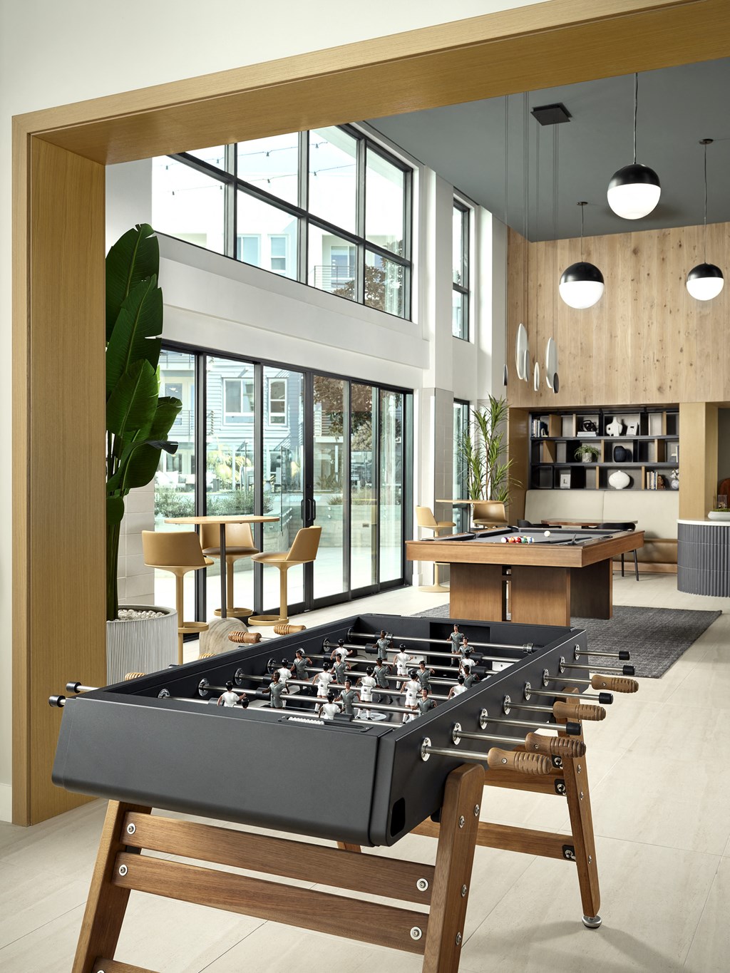 a foosball table in the middle of a living room