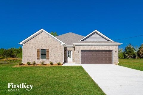 A house with a garage is for sale by FirstKey Homes.