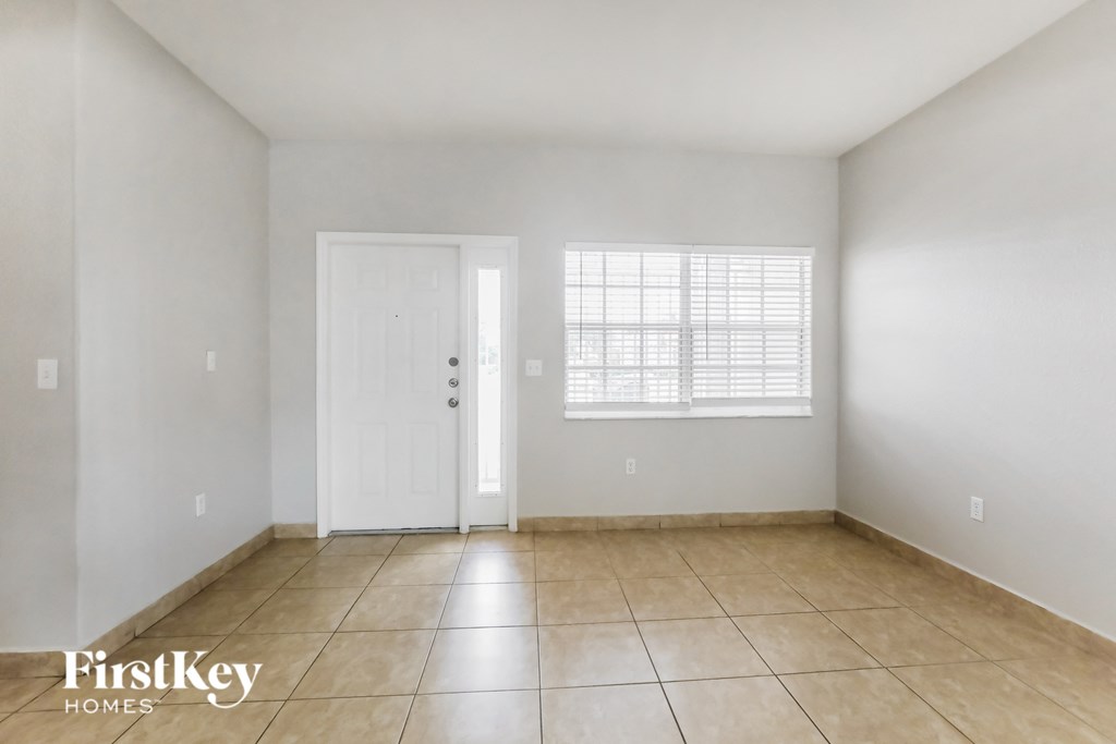 the spacious living room is clean and ready for you to use