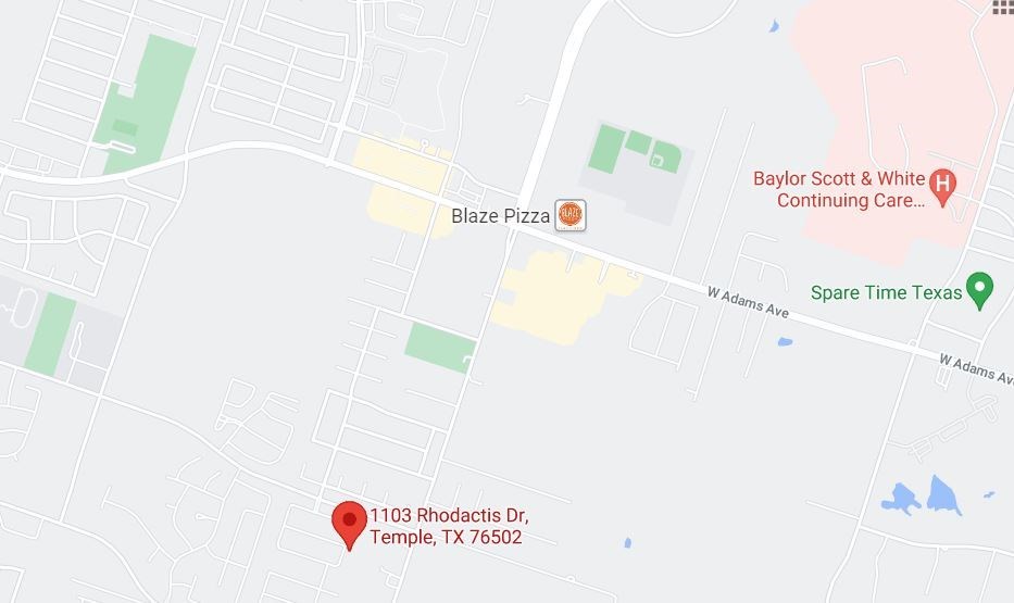 a map of a city with red and green markers on it