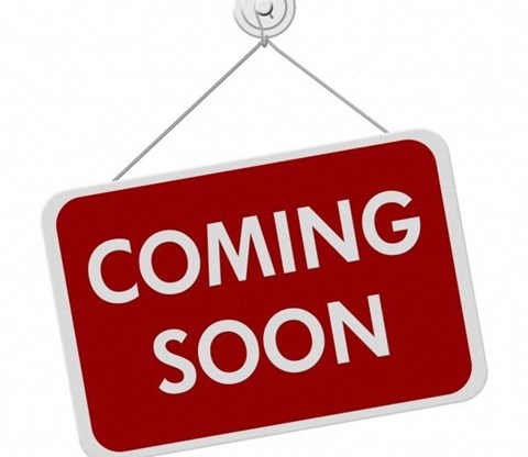 A red sign with the words "COMING SOON" in white.