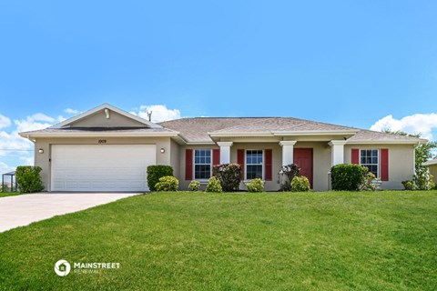 a house with a lawn in front of it