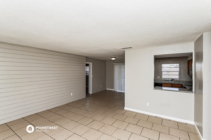 the living room and dining room are spacious and open to the kitchen
