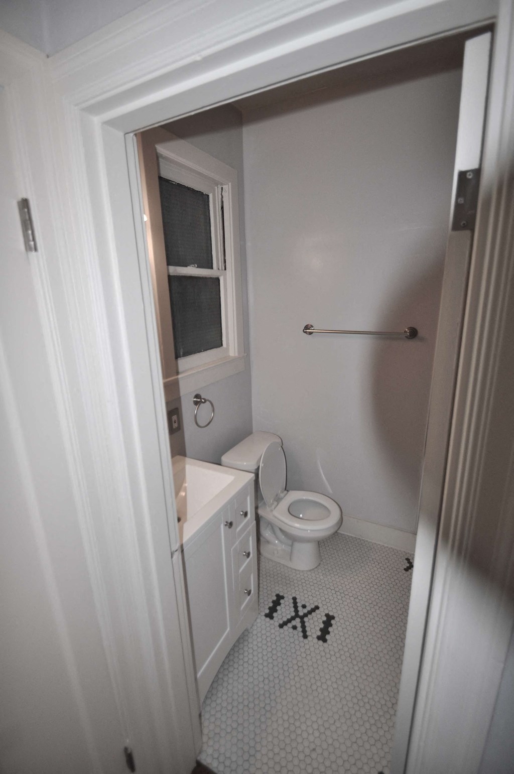 a small bathroom with a toilet and a sink