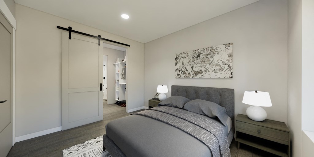 a bedroom with a bed and a closet