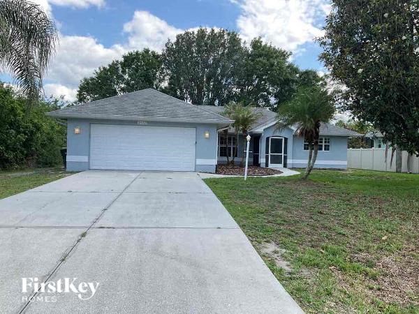 A house with a driveway in front of it.