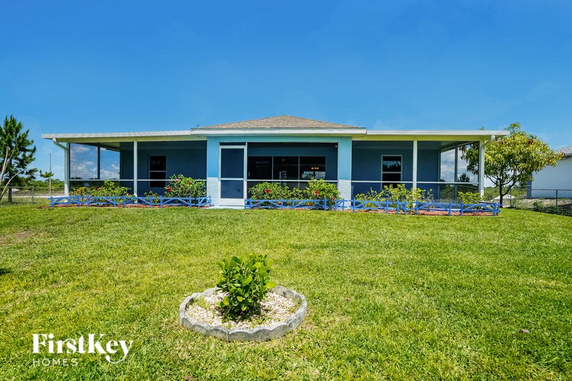a house with a lawn in front of it