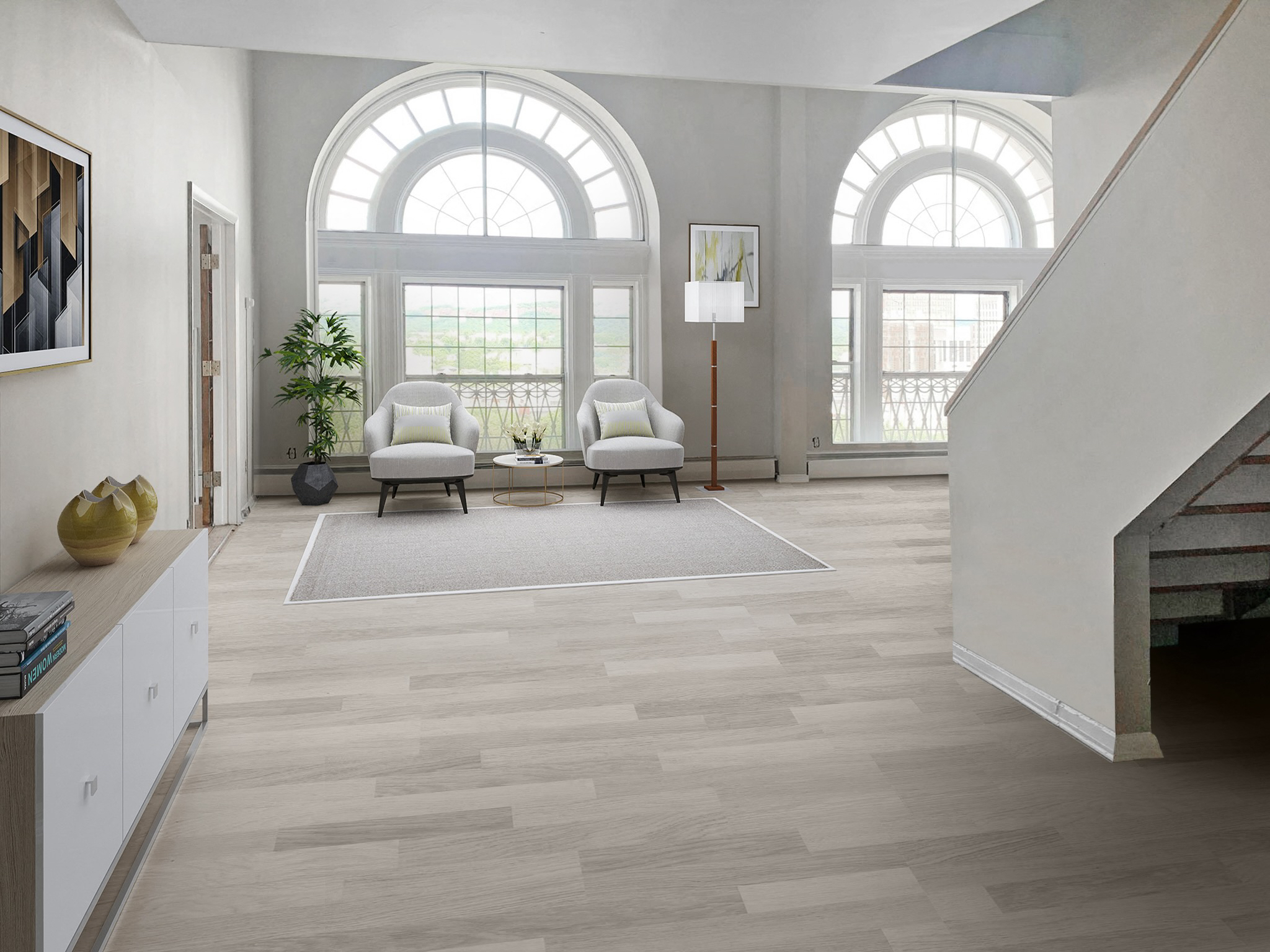 a living room with two white chairs and a rug and two large windows