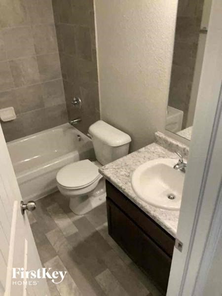 a small bathroom with a toilet and a sink