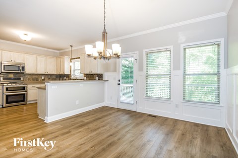 the kitchen and dining room of an open floor plan