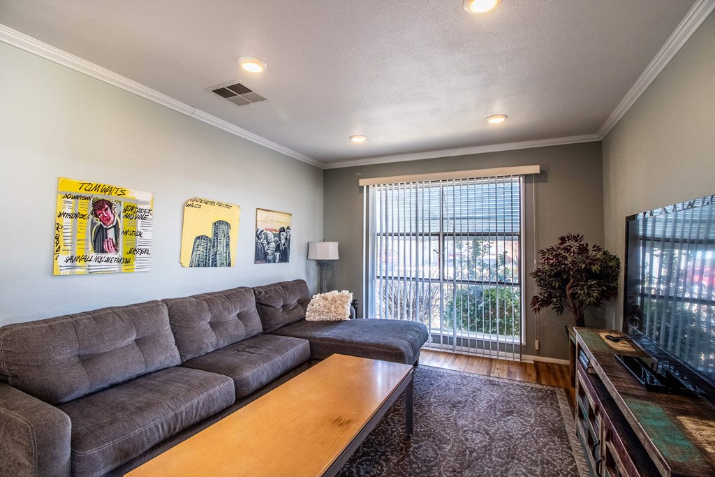 a living room with a couch and a coffee table