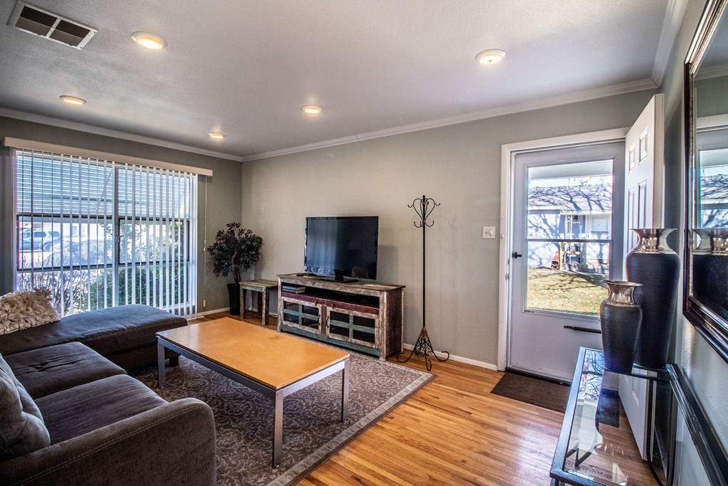 a living room with a couch and a television