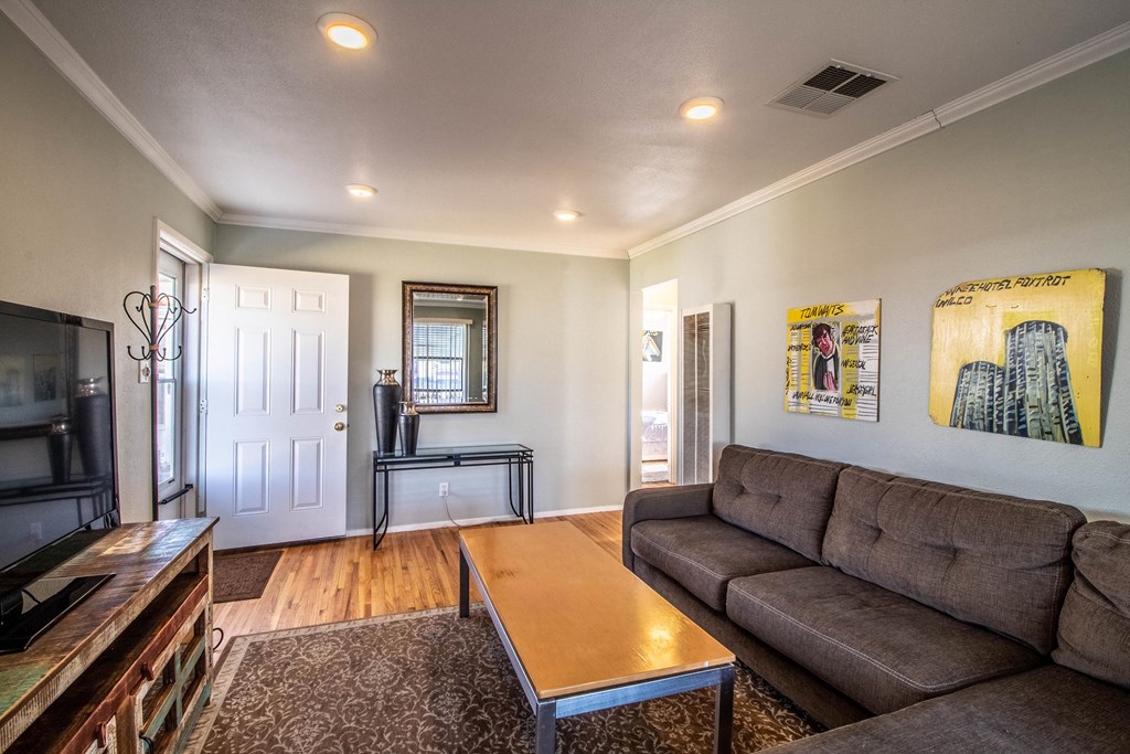 a living room with a couch and a coffee table
