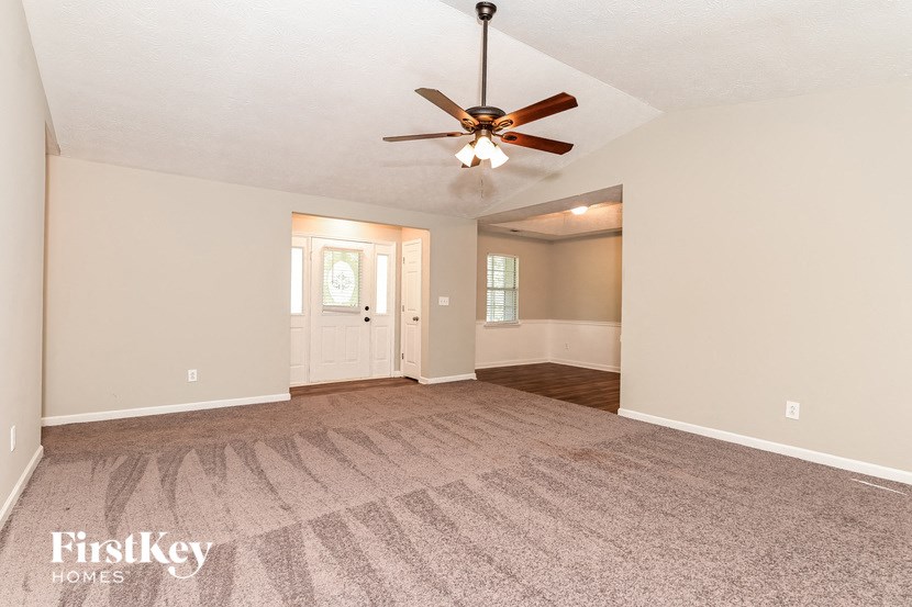 the living room and dining room are spacious and clean