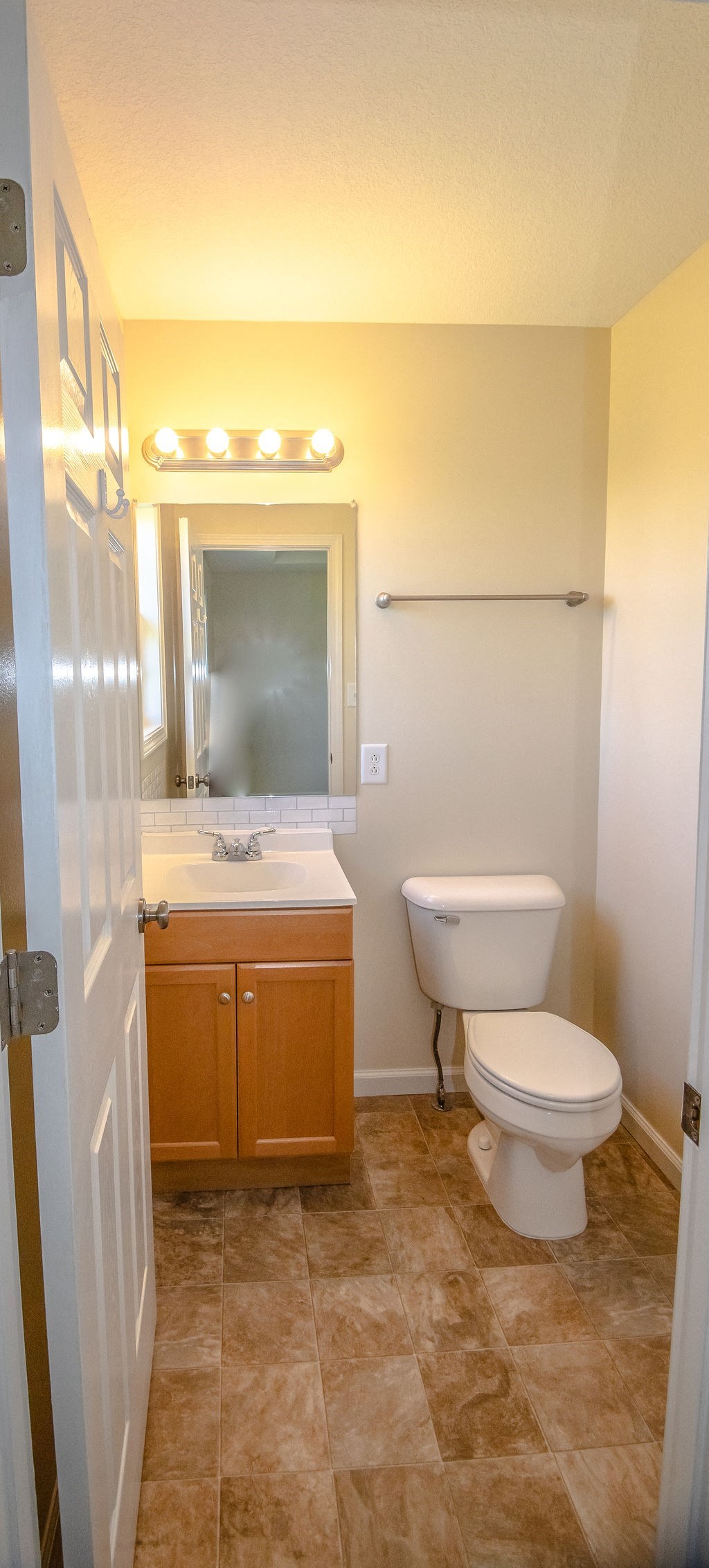 a small bathroom with a toilet and a sink