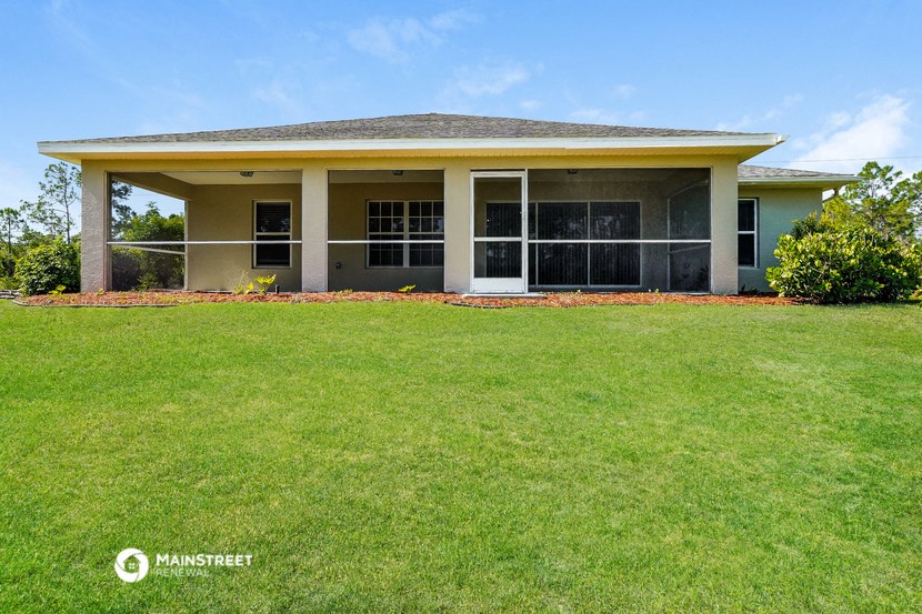 a large lawn in front of a house