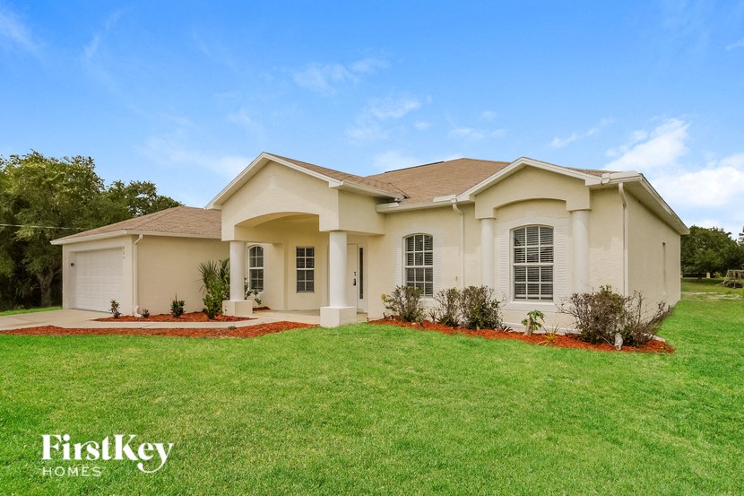 a house with a lawn in front of it