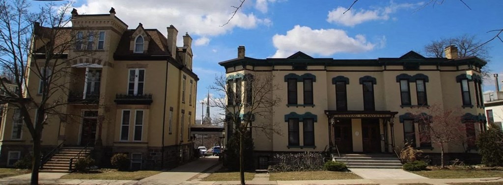 a row of houses on a city street