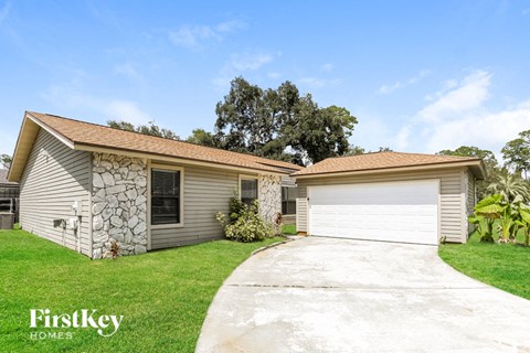 a house with a garage and a driveway
