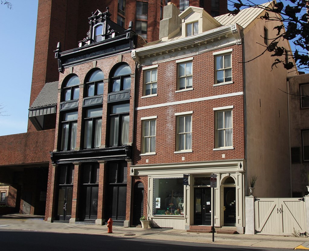 a brick building on the corner of a street