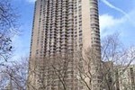 a tall building with trees in front of it