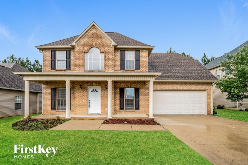 brand new home in a neighborhood with a large lawn
