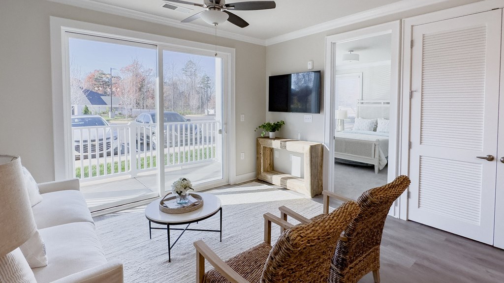 a living room with a couch and a tv