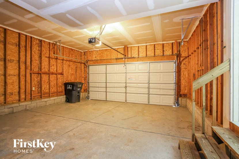 the garage of a house with a white garage door