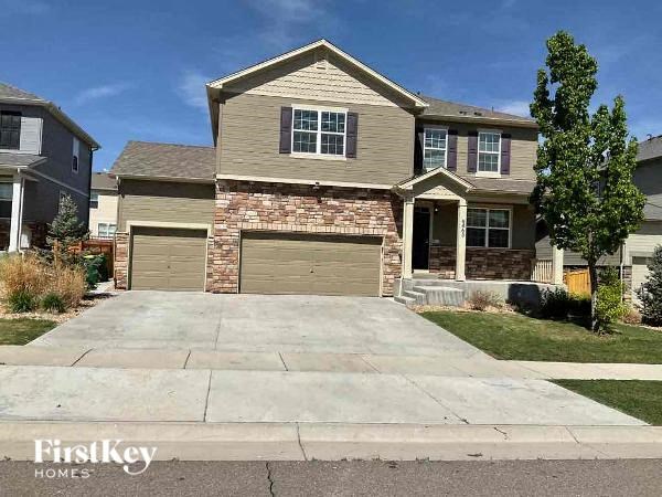 a house with a driveway in front of it