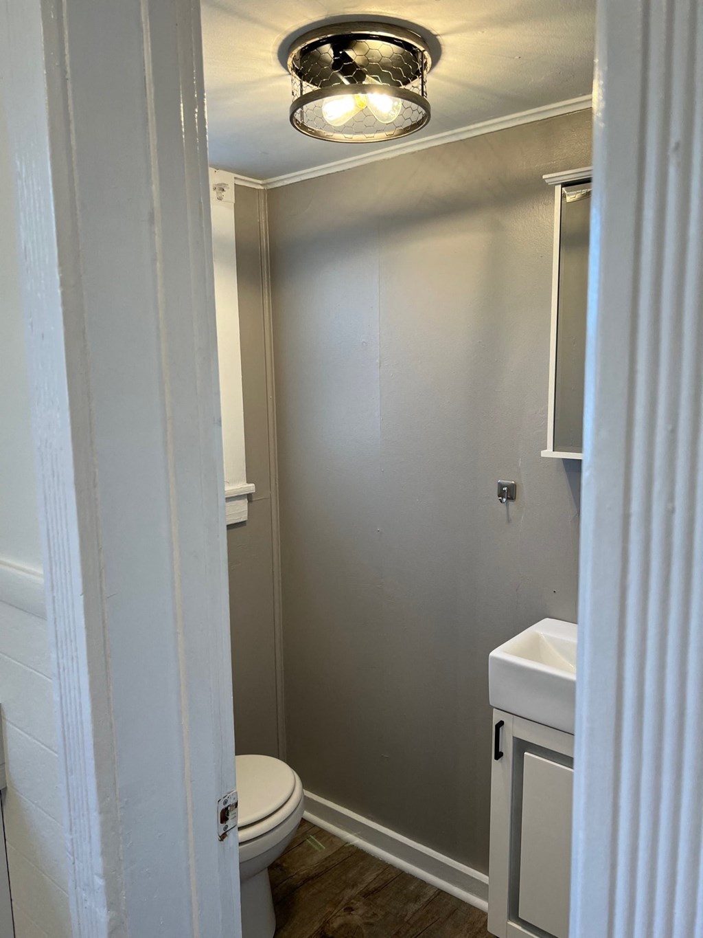 a small bathroom with a toilet and a sink