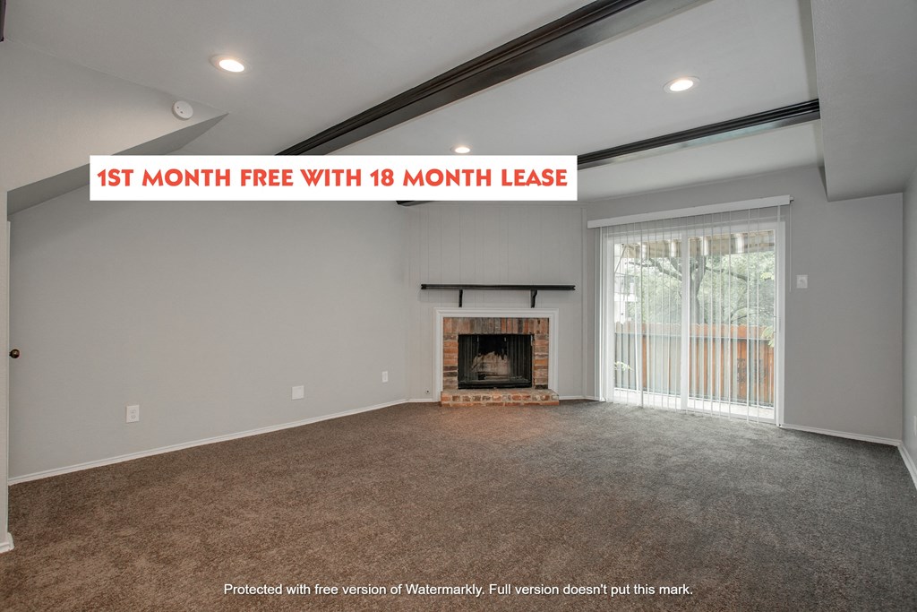 a 1st month free with 16 month lease on a room with a fireplace