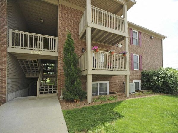 a building with two balconies on the side of it