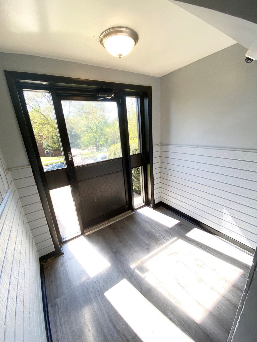 a view of the front door from the inside of a house