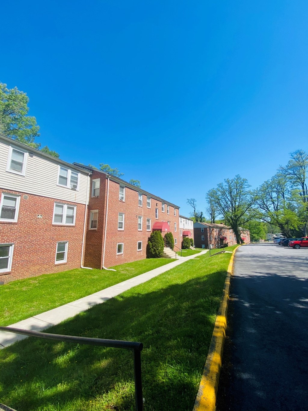 our apartments are located in a quiet neighborhood with green grass
