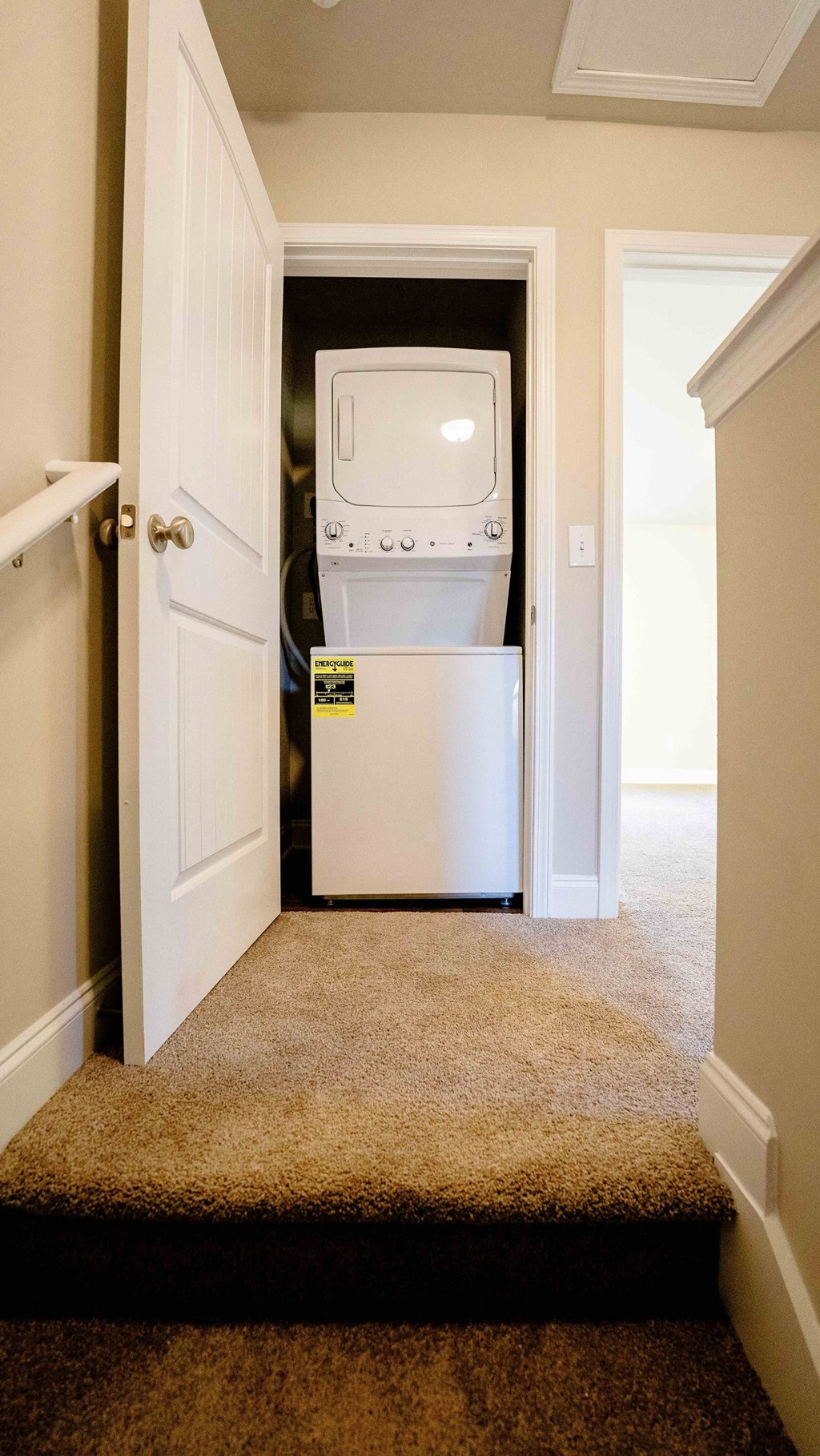 a laundry room with a washer and dryer in it