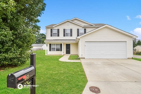 a house with a mailbox in front of it