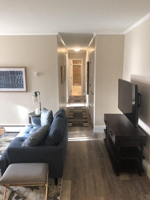 a living room with a couch and a tv