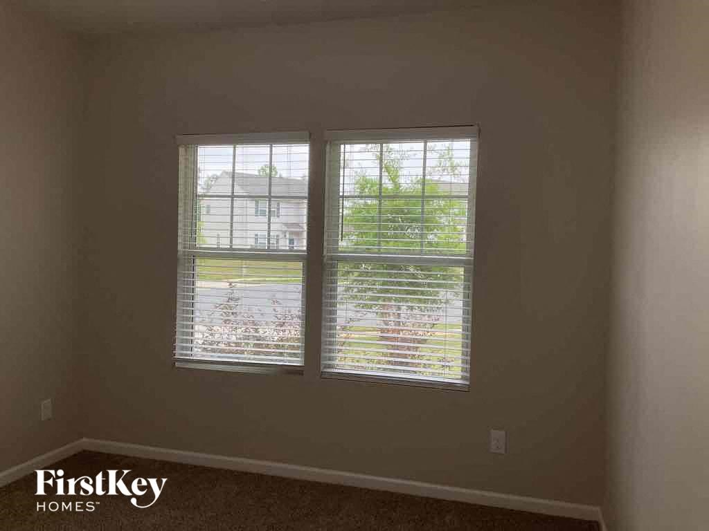 a view of two windows in a room