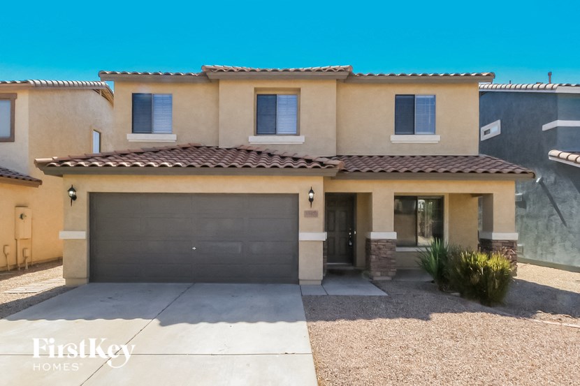 A house with a garage is for sale by FirstKey Homes.