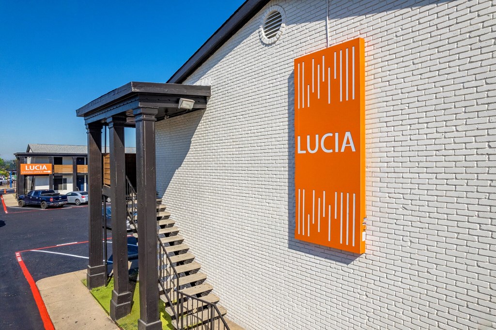 a sign on the side of a building that says